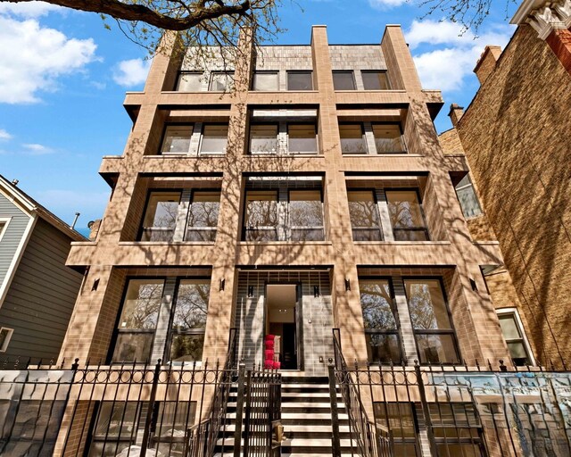 1646 N Orchard St Unit 1N, Chicago, IL 60614 - view of apartment building / complex with a fenced front yard