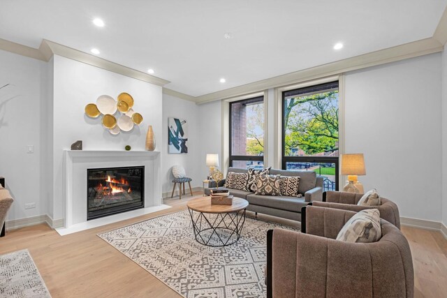 1646 N Orchard St Unit 1N, Chicago, IL 60614 - living area featuring light wood-style floors, a fireplace with flush hearth, recessed lighting, and baseboards