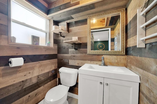 5640 W 82nd Pl, Burbank, IL 60459 - bathroom featuring wood walls, toilet, and vanity