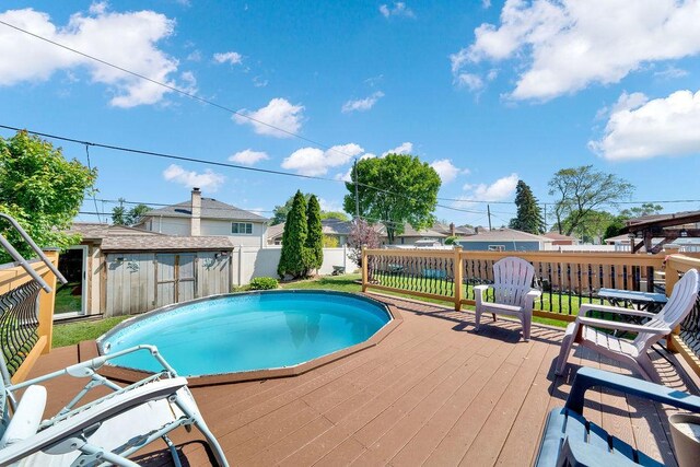 5640 W 82nd Pl, Burbank, IL 60459 - view of pool featuring a deck, a fenced backyard, and a residential view