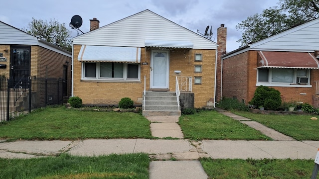 4542 S Lamon Ave, Chicago, IL 60638 - bungalow-style house featuring brick siding and a chimney