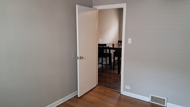 4542 S Lamon Ave, Chicago, IL 60638 - unfurnished room with wood finished floors and baseboards