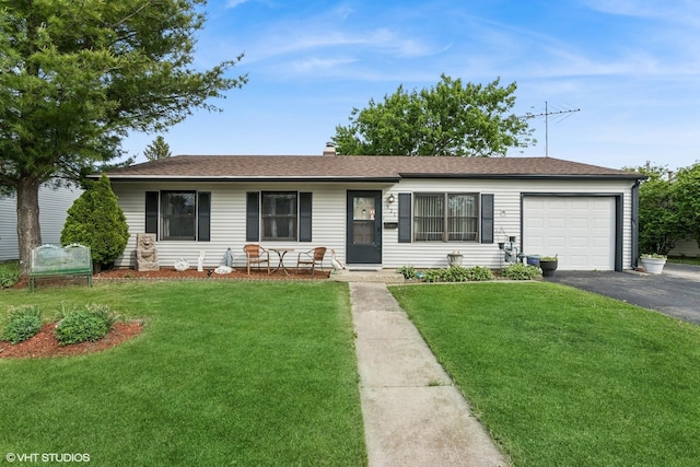 521 Montrose Dr, Romeoville, IL 60446 - ranch-style house featuring asphalt driveway, an attached garage, a front yard, and a chimney