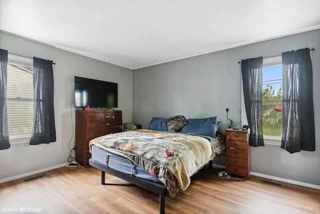 521 Montrose Dr, Romeoville, IL 60446 - bedroom featuring wood finished floors and baseboards