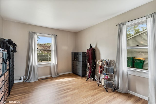 521 Montrose Dr, Romeoville, IL 60446 - miscellaneous room featuring light wood-style flooring and baseboards
