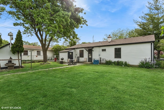 521 Montrose Dr, Romeoville, IL 60446 - back of house featuring a patio and a chimney