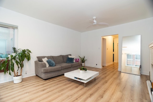 932 W Sunnyside Ave Unit 1C, Chicago, IL 60640 - living area featuring light wood-style floors, ceiling fan, and baseboards