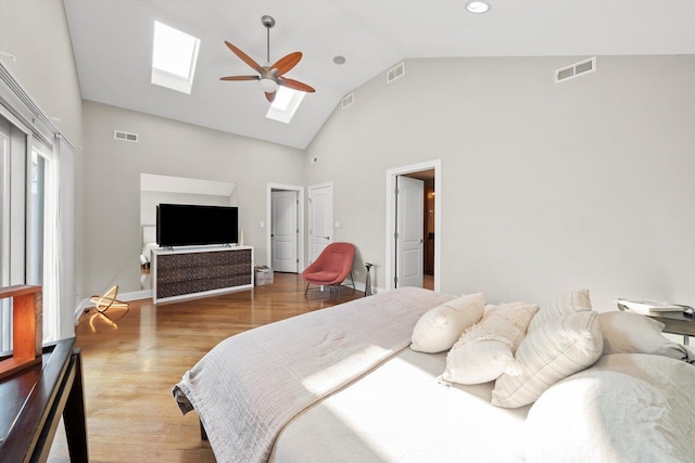 6205 W Grace St, Chicago, IL 60634 - bedroom featuring a skylight, high vaulted ceiling, wood finished floors, a ceiling fan, and baseboards