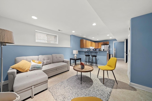 6205 W Grace St, Chicago, IL 60634 - living area with light tile patterned floors, recessed lighting, and baseboards
