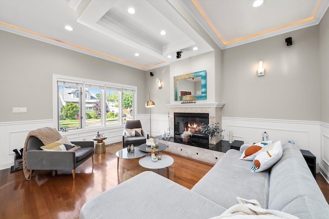 6205 W Grace St, Chicago, IL 60634 - living area with ornamental molding, a wainscoted wall, a glass covered fireplace, wood finished floors, and recessed lighting