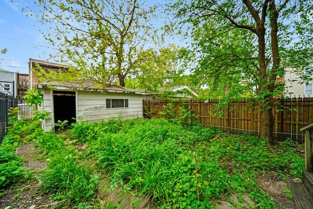 6146 S Morgan St, Chicago, IL 60621 - fenced backyard featuring an outbuilding