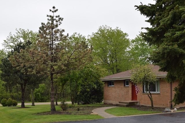 1012 Elsie Ave, Gurnee, IL 60031 - view of front of property with brick siding and a front yard