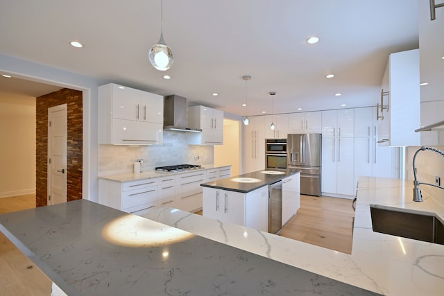 3548 Grandmore Ave, Gurnee, IL 60031 - kitchen with wall chimney range hood, stainless steel appliances, a sink, modern cabinets, and recessed lighting