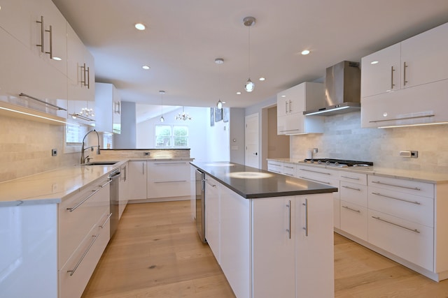 3548 Grandmore Ave, Gurnee, IL 60031 - kitchen with wall chimney exhaust hood, a sink, stainless steel gas stovetop, backsplash, and recessed lighting
