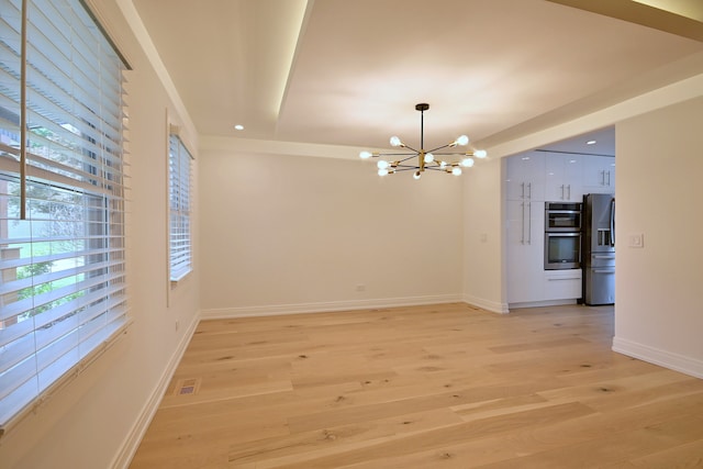 3548 Grandmore Ave, Gurnee, IL 60031 - unfurnished dining area featuring a chandelier, light wood-type flooring, baseboards, and recessed lighting
