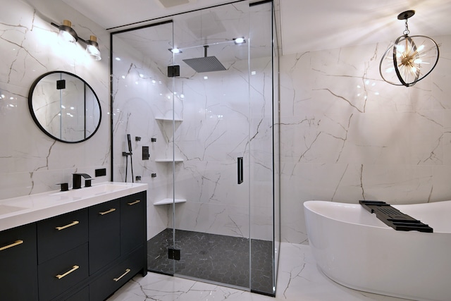 3548 Grandmore Ave, Gurnee, IL 60031 - full bathroom with marble tiled floors, a marble finish shower, double vanity, a freestanding tub, and tile walls