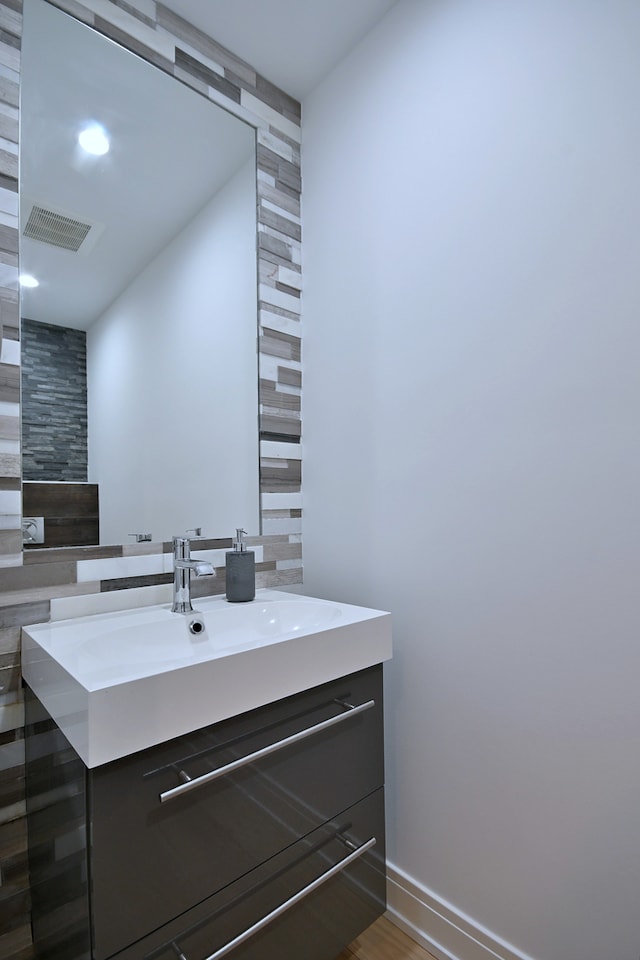 3548 Grandmore Ave, Gurnee, IL 60031 - bathroom with vanity and baseboards