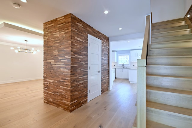 3548 Grandmore Ave, Gurnee, IL 60031 - stairway featuring wood finished floors, a chandelier, and recessed lighting