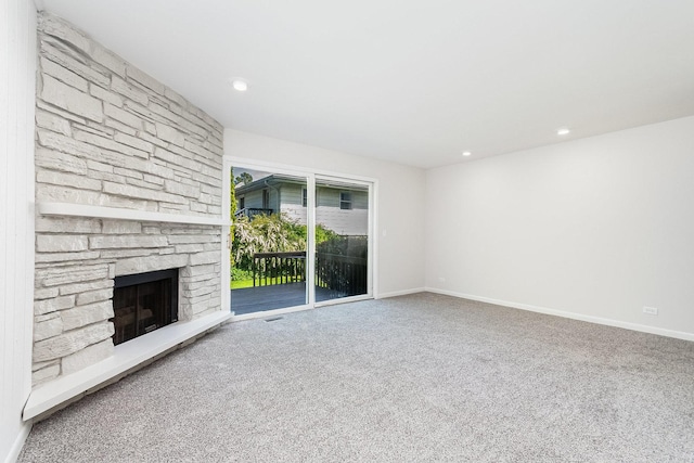 334 Ashland Ave, Highwood, IL 60040 - unfurnished living room featuring carpet flooring, a fireplace, baseboards, and recessed lighting
