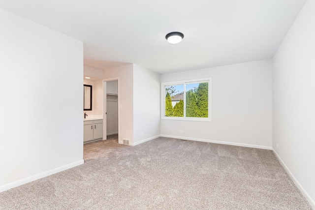334 Ashland Ave, Highwood, IL 60040 - unfurnished bedroom featuring light colored carpet and baseboards