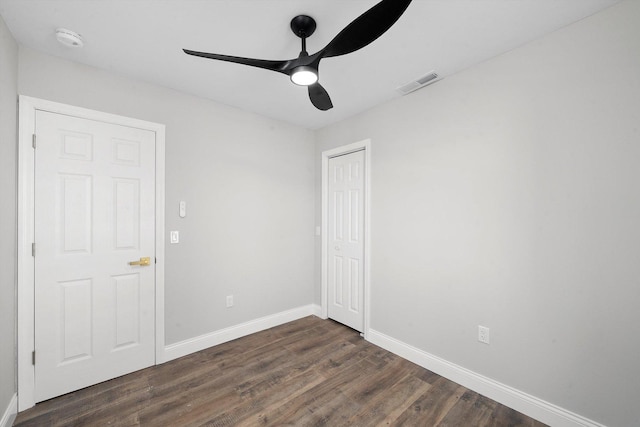 1326 N Poplar Ave, Round Lake Beach, IL 60073 - spare room with a smoke detector, dark wood finished floors, and a ceiling fan