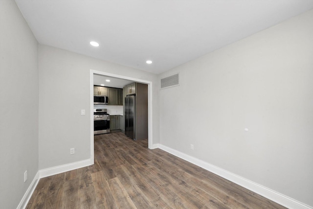 1326 N Poplar Ave, Round Lake Beach, IL 60073 - unfurnished living room featuring dark wood finished floors and recessed lighting