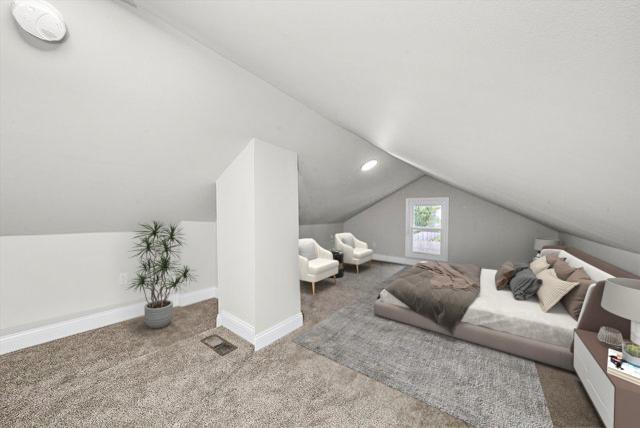 1326 N Poplar Ave, Round Lake Beach, IL 60073 - bedroom featuring lofted ceiling and carpet floors