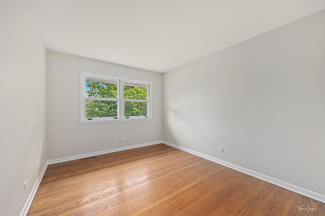 314 Oak Ave, Westmont, IL 60559 - unfurnished room with baseboards and light wood-type flooring
