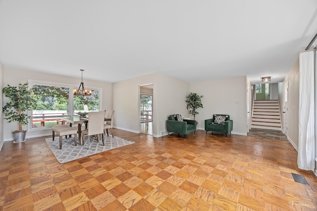 314 Oak Ave, Westmont, IL 60559 - dining space featuring stairs and a chandelier