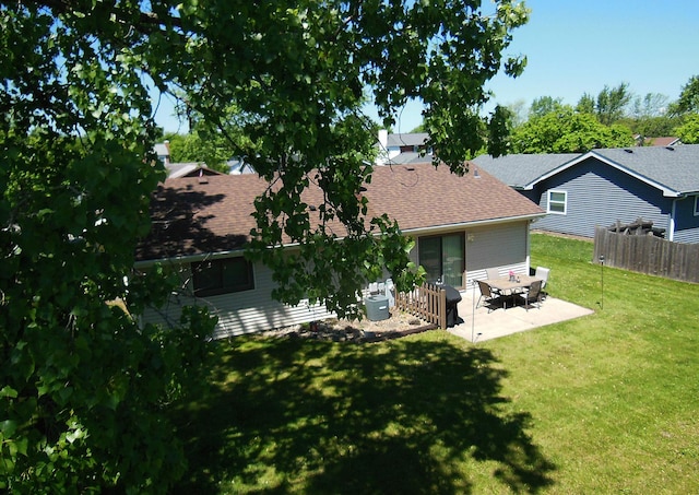 4585 Zeppelin Dr, Hanover Park, IL 60133 - rear view of property with roof with shingles and a patio area