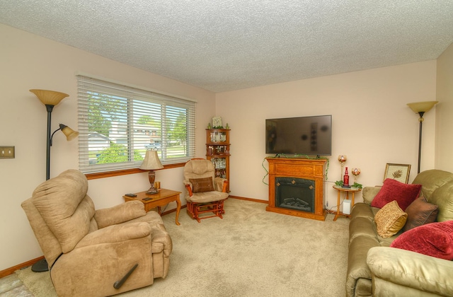 4585 Zeppelin Dr, Hanover Park, IL 60133 - carpeted living room featuring a textured ceiling, a fireplace, and baseboards