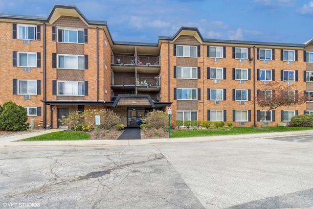 1106 S New Wilke Rd Unit 401, Arlington Heights, IL 60005 - view of apartment building / complex