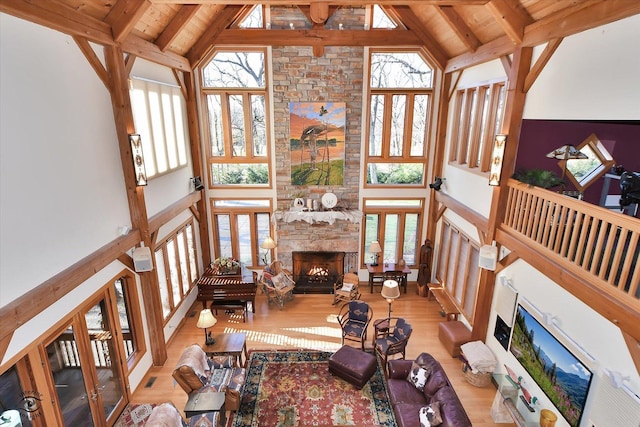 4776A W State Route 102, Bourbonnais, IL 60914 - living room featuring a fireplace, high vaulted ceiling, wood finished floors, and a wood ceiling with exposed beams