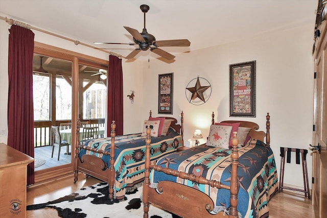 4776A W State Route 102, Bourbonnais, IL 60914 - bedroom with access to exterior, wood finished floors, and a ceiling fan