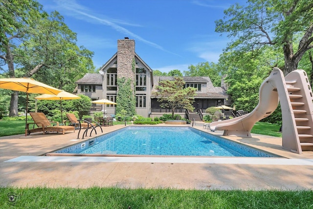 4776A W State Route 102, Bourbonnais, IL 60914 - outdoor pool featuring a water slide and a patio