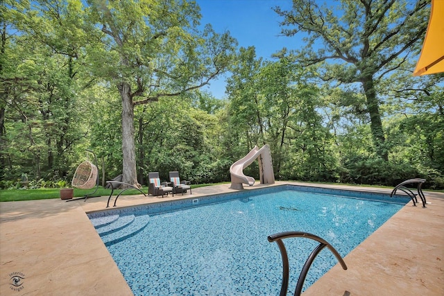 4776A W State Route 102, Bourbonnais, IL 60914 - swimming pool featuring a water slide and a patio
