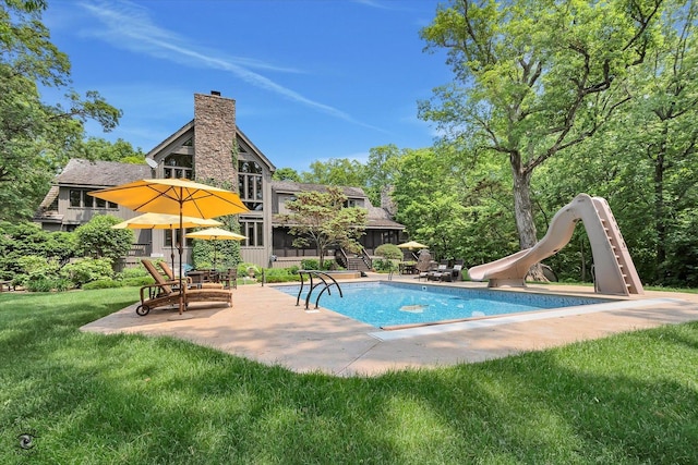 4776A W State Route 102, Bourbonnais, IL 60914 - outdoor pool featuring a water slide, a patio, and a lawn