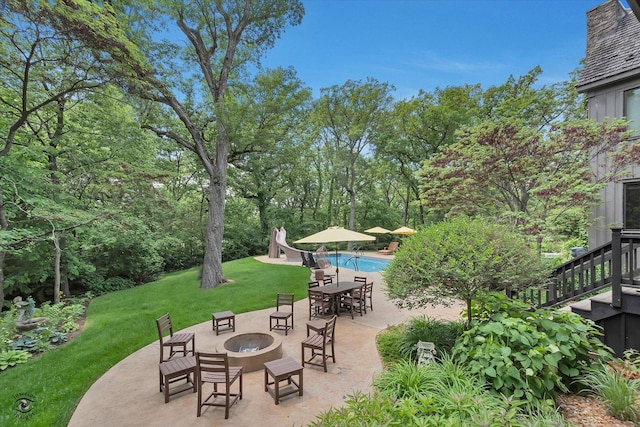 4776A W State Route 102, Bourbonnais, IL 60914 - view of patio with an outdoor fire pit, an outdoor pool, and stairway