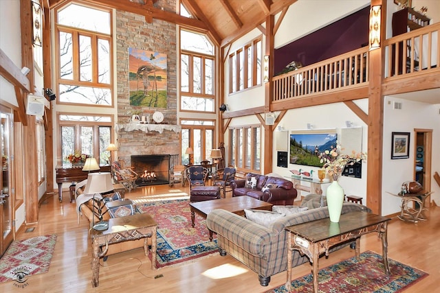 4776A W State Route 102, Bourbonnais, IL 60914 - living room featuring high vaulted ceiling, wood finished floors, a fireplace, and beamed ceiling