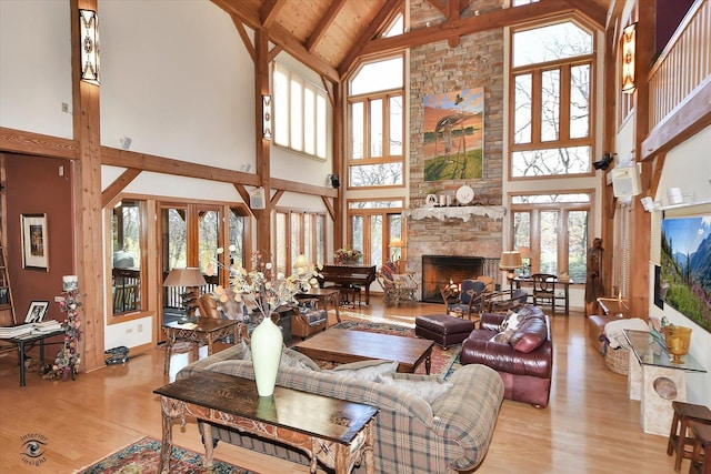 4776A W State Route 102, Bourbonnais, IL 60914 - living area featuring high vaulted ceiling, wood finished floors, a stone fireplace, and a wooden ceiling with exposed beams