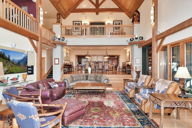 4776A W State Route 102, Bourbonnais, IL 60914 - living area with high vaulted ceiling, wood finished floors, stairs, a wooden ceiling with exposed beams, and recessed lighting