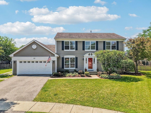 63 E Cambridge Ct, Grayslake, IL 60030 - colonial house featuring driveway and an attached garage