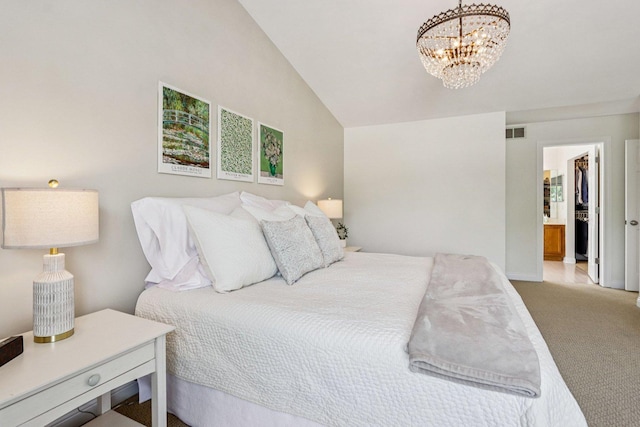 63 E Cambridge Ct, Grayslake, IL 60030 - carpeted bedroom with a chandelier, vaulted ceiling, and a spacious closet
