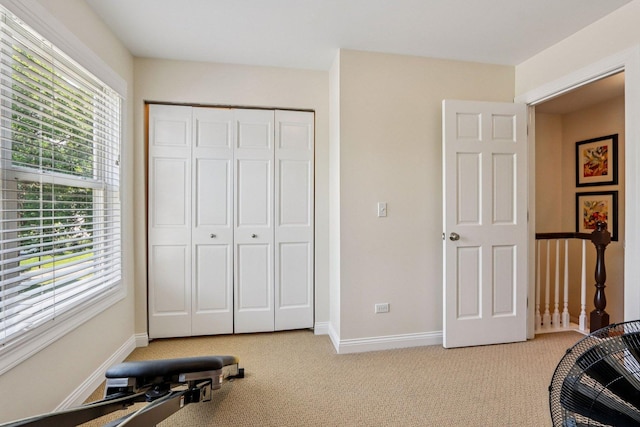 63 E Cambridge Ct, Grayslake, IL 60030 - workout room with light colored carpet and baseboards