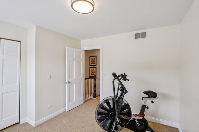 63 E Cambridge Ct, Grayslake, IL 60030 - workout room with light carpet and baseboards