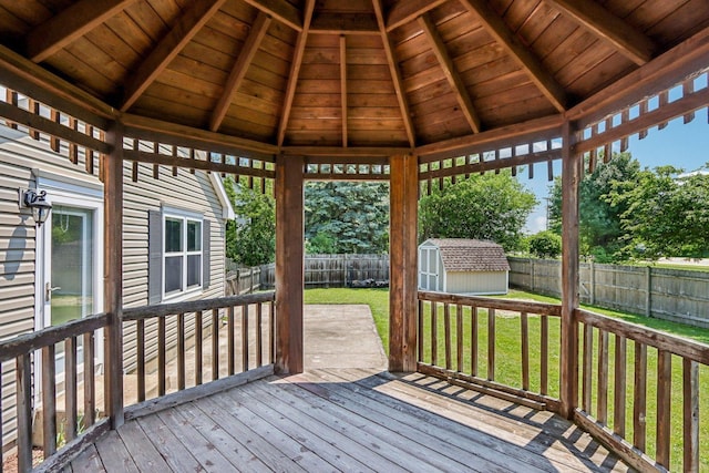 63 E Cambridge Ct, Grayslake, IL 60030 - wooden terrace with a fenced backyard and a shed