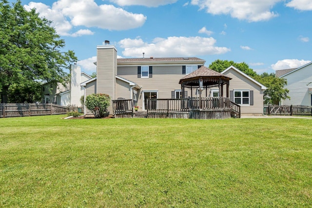 63 E Cambridge Ct, Grayslake, IL 60030 - back of property featuring a gazebo, a chimney, and a wooden deck