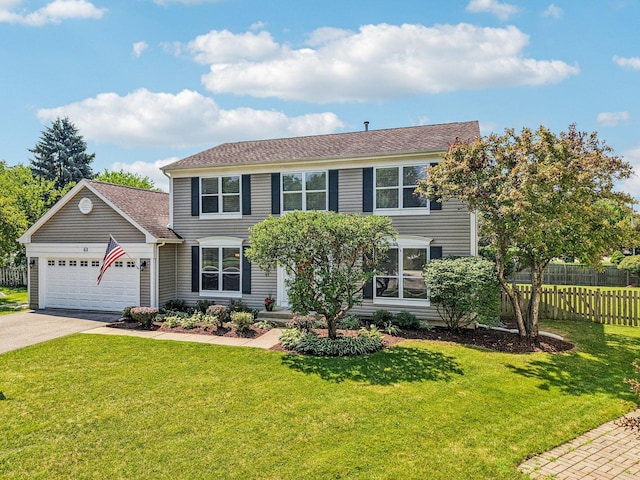 63 E Cambridge Ct, Grayslake, IL 60030 - colonial inspired home featuring a garage, concrete driveway, and a shingled roof