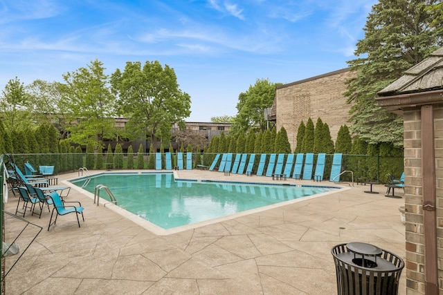 1718 Northfield Sq Unit F, Northfield, IL 60093 - community pool featuring a patio