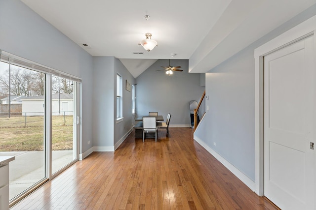 15256 State St, South Holland, IL 60473 - dining room with light wood-style floors, ceiling fan, stairs, baseboards, and vaulted ceiling